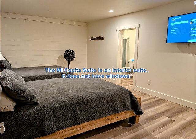 2 Queen beds and Full Bathroom - This is an interior unit without windows. 