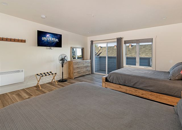 Shogun Suite has two queen beds, Smart TV, private bathroom and a porch. 