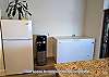 Full sized refrigerator and freezer in shared kitchen