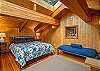 Loft bedroom with queen bed