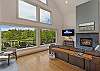 Living room with gas fireplace and Smart tv