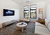 View of downtown Friday Harbor and Brown Island. Enjoy the comfort of this luxury condo with Smart TV access. 