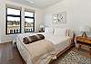 Bedroom #1: King bed with views of downtown Friday Harbor and Brown Island. 