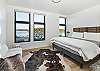 Bedroom #1: King split bedroom with en suite bathroom and an expansive water view. 

*The King-split bedroom is made up as a King bed. Please notify our office before your arrival if you'd like the two twin beds set up. We will not be able to change the configuration once you arrive. 