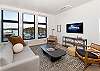 Relax and unwind in this modern, 3rd floor penthouse which watching the ferry arrive.