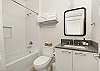 Bathroom #2: Full bathroom with tiled shower and tub 