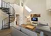 Spiral staircase leads to the loft