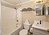 Bathroom #2: Main floor full en suite full bathroom to bedroom #2