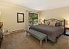 Bedroom #2: Main floor king bedroom with en suite full bathroom