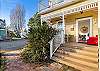 Pathway and stairs leading to unit entrance from parking space. Comfortable deck seating for enjoying your morning or evening beverage. 