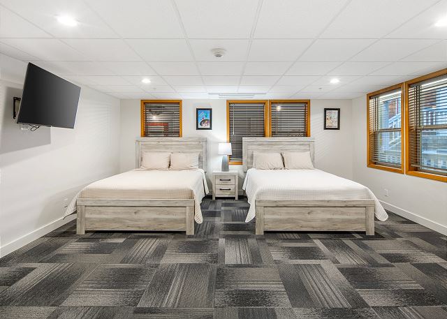 Two queen beds and a Smart TV