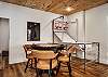 Game room with pool table, video game table, and game table