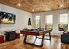 Game room with pool, game table basket ball and video game table
