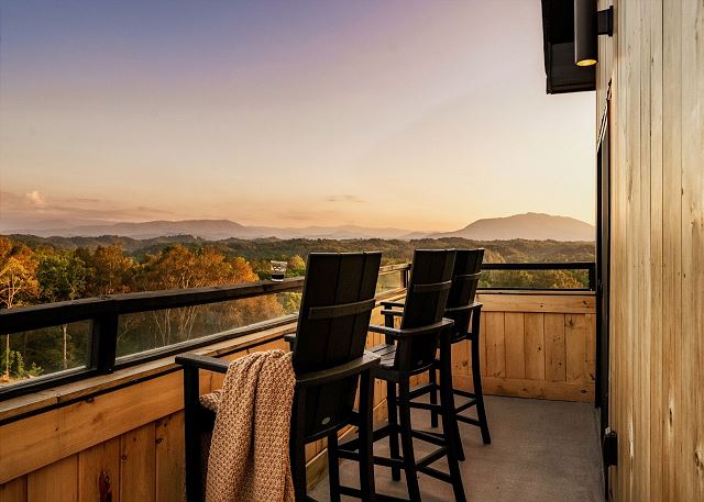 Five bedroom, five bathroom condo with a mountain view