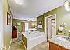 Primary Bedroom with King Bed, Private Bathroom, Cable TV and Wifi