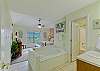 Primary Bedroom with King Bed, Private Bathroom, Cable TV and Wifi