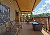 Outdoor deck with table to have a family meal and sitting to enjoy the outside