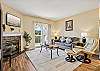 Spacious Living Room with Gas Fireplace, Sleeper Sofa and SMART TV with Cable & WIFI throughout vacation rental