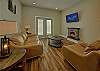 Spacious Living Room with Electric Fireplace and SMART TV with Cable & WIFI throughout vacation rental