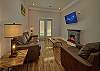 Spacious Living Room with Electric Fireplace and SMART TV with Cable & WIFI throughout vacation rental