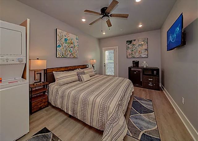 Spacious one room studio condo with king bed, tv, coffee maker, refrigerator and microwave 