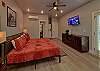 Spacious one-room studio condo with a king bed, tv, microwave, coffee maker and small refrigerator