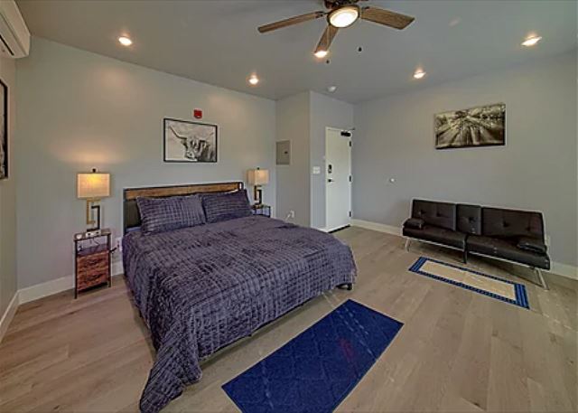 Spacious one-room studio condo with a king bed, tv, microwave, coffee maker and small refrigerator