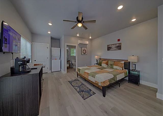 Spacious one room studio condo with king bed, tv, coffee maker, refrigerator and microwave 