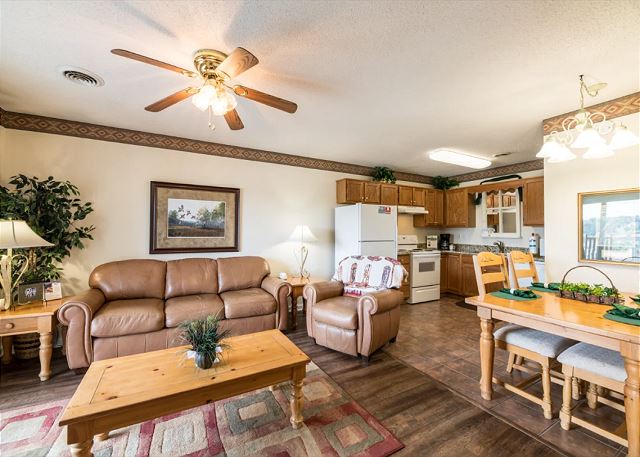 Spacious Living Room with Gas Fireplace, Sleeper Sofa and SMART TV with Cable & WIFI throughout vacation rental