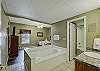 Primary Bedroom with King Bed, Private Bathroom, Cable TV and Wifi