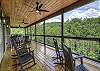 Upper balcony with wooded and mountain views