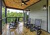 Upper balcony with wooded and mountain views
