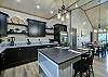 Spacious living room and kitchen with dining