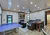 Game room with ping pong table, game table and sitting area
