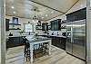 Spacious living room and kitchen with dining