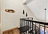 Top floor loft with twin bunk beds and private bathroom.