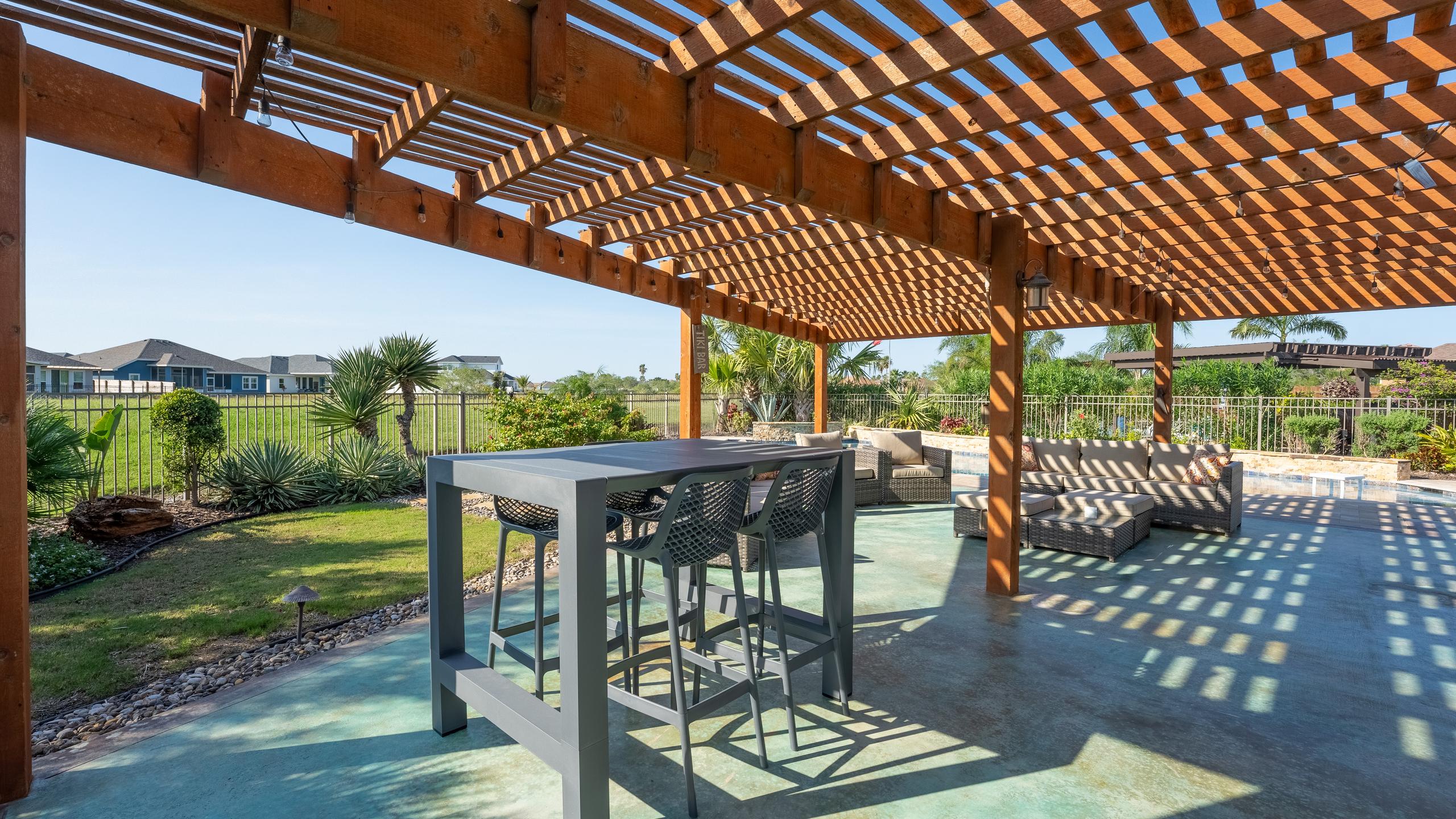 South Padre Golf Community Home with a Backyard Paradise | Photo 15