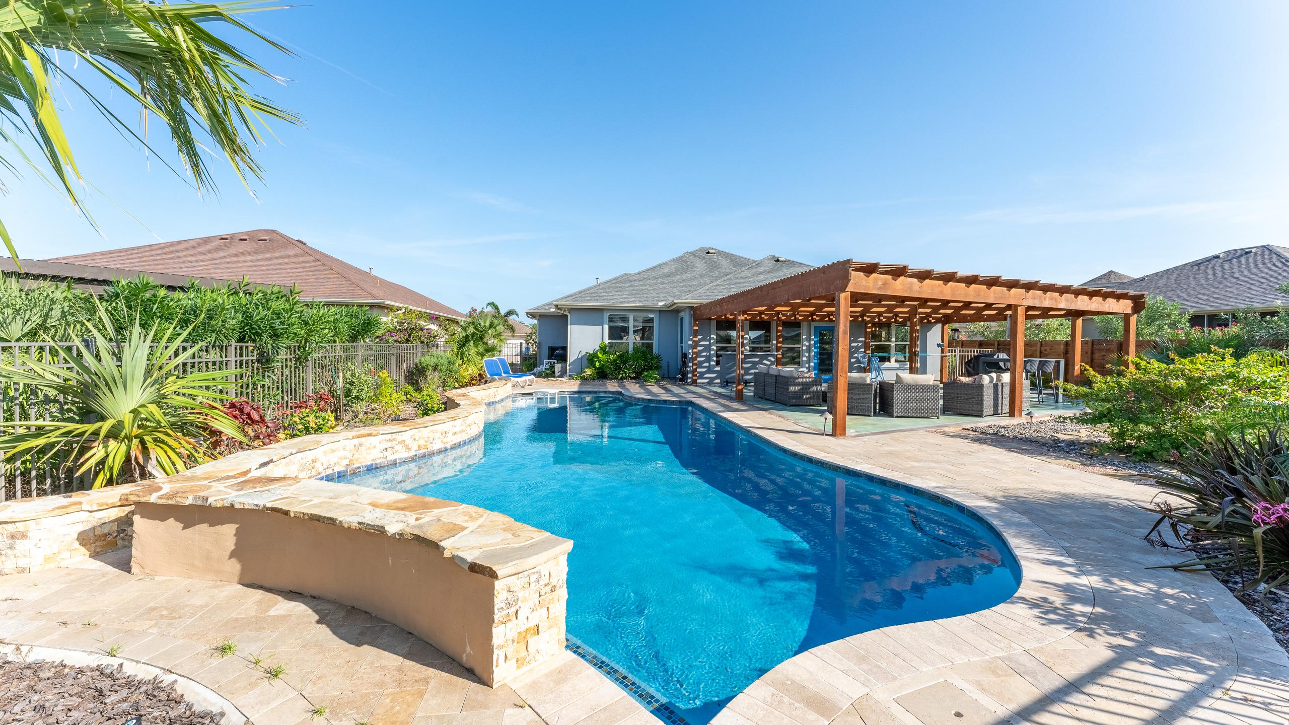 South Padre Golf Community Home with a Backyard Paradise | Photo 38