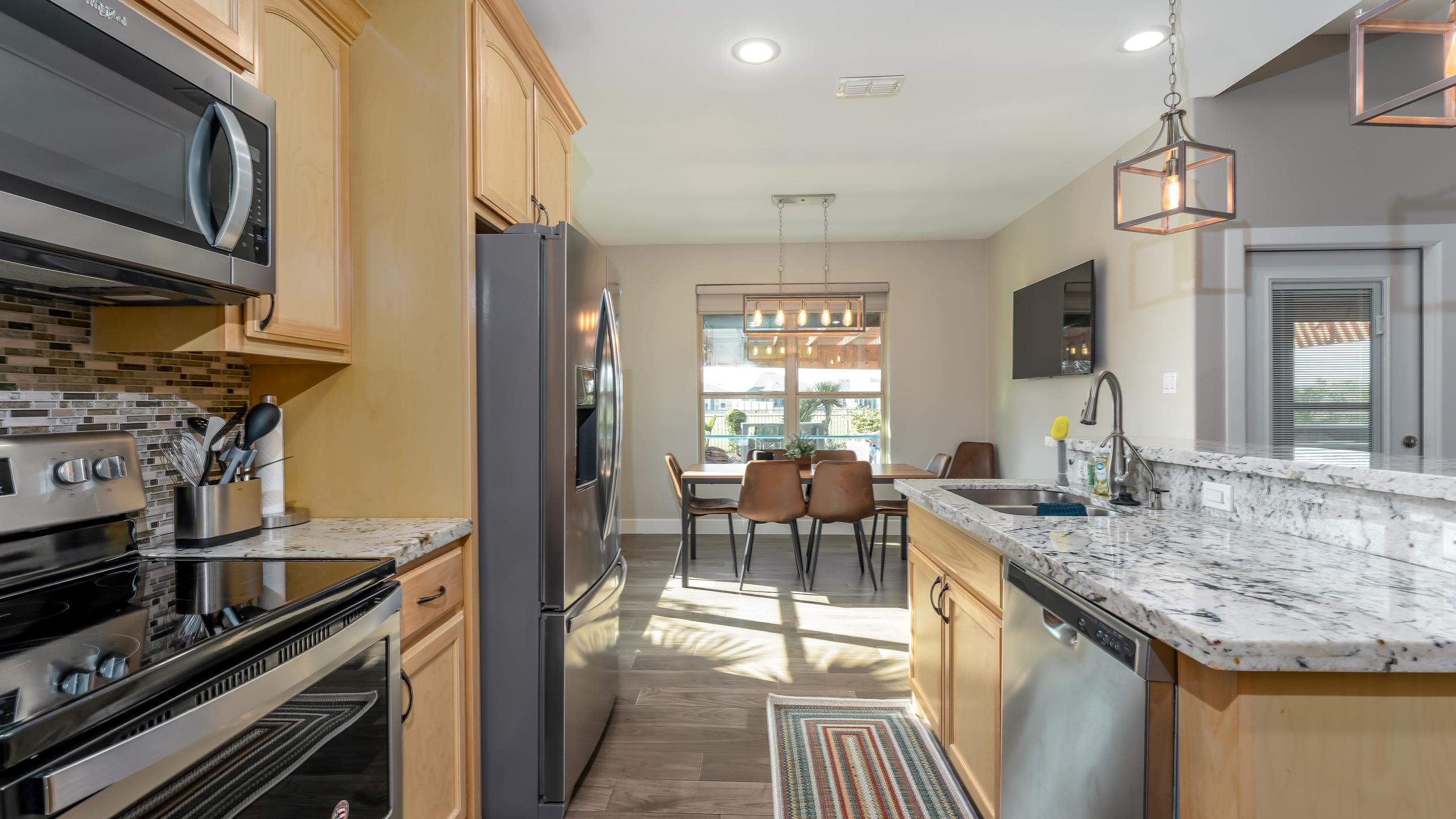 South Padre Golf Community Home with a Backyard Paradise | Photo 7