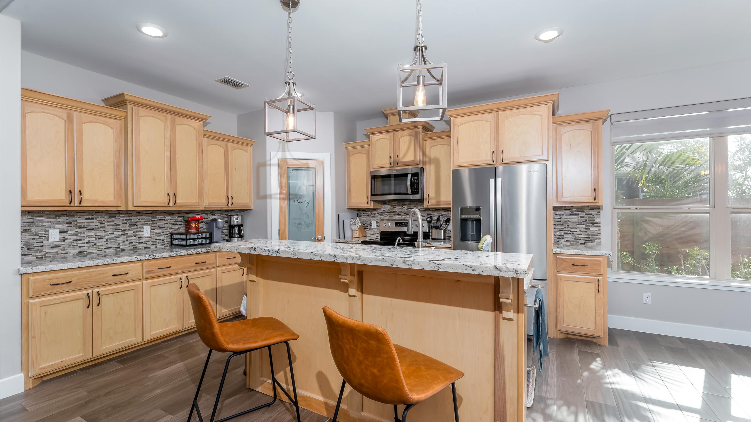 South Padre Golf Community Home with a Backyard Paradise | Photo 11