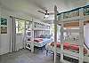 Third bedroom with 2 queen/twin bunkbeds and access to the outdoor screened in pati