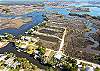 Exterior drone shot showing the canal and Crystal River