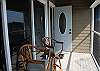 Upper front entrance with deck seating with views of St. Martins Preserve Marsh