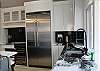 Gourmet kitchen with all new Viking Appliances, including a large professional refrigerator and wine cooler