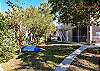 Exterior back yard with kayaks 