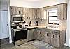 Fully equipped kitchen with all new stainless appliances