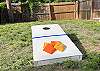 Back yard with corn hole