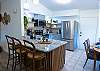 Kitchen with island and dining table