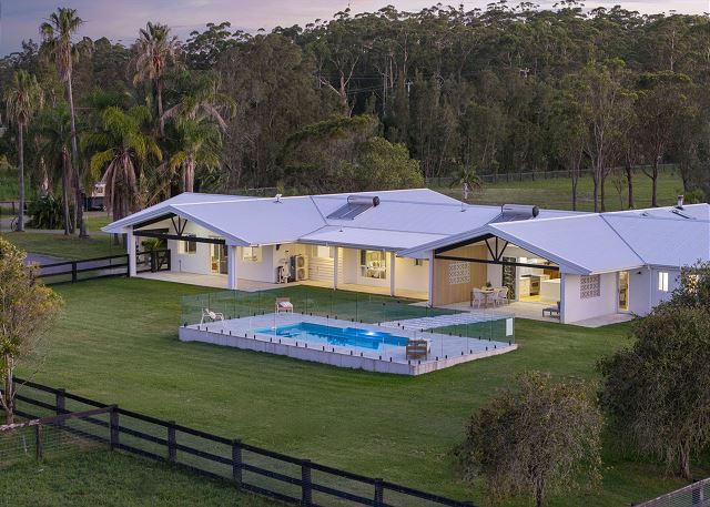 The Coastal Palms Estate – Pool and Country Views 