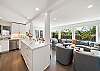 Kitchen Bar open to dining room and Living room with electric fireplace, Streaming TV